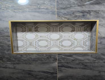 Photos by MC ALISTER TILE #1 5 showers total, was hired after another handyman did not water proof correctly, fixed all water proofing and installed 