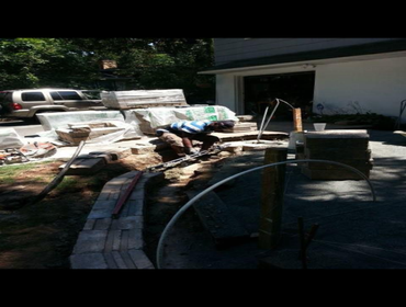 Outside work pavers, addition and siding. Photos of outside work. Back yard pavers
