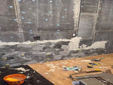 Photos by Strong Innovative Structures Inc #3 Interior renovation including cement board installation, full-height feature wall tile installation, and 