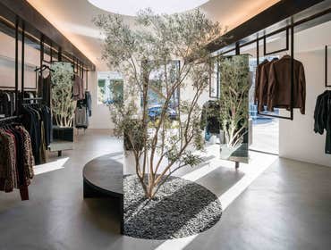 RtA Flagship Previously a rug store, the space was converted into the flagship store for the luxury clothing brand RtA. The black exterior of the build