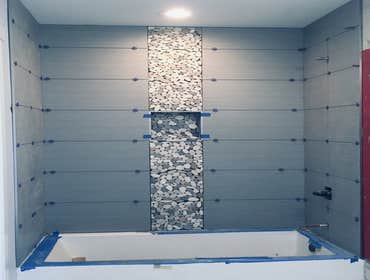 Tile Projects by Nobleman Construction Tile installation, repair, replacement. Complete bathrooms and kitchen remodels.