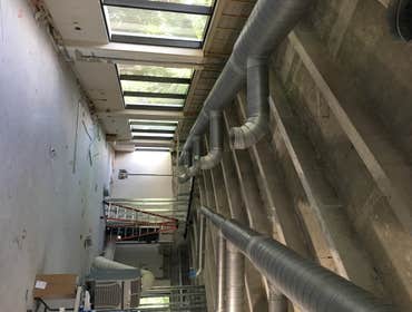 Art gallery on hollywood Blvd Metal ductwork and VAV units installation along with IView controls from Carrier.