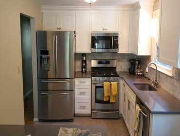 Photos by Wade Construction & Remodeling #5 Remodeled a kitchen after ice damn damage to exterior walls and floor