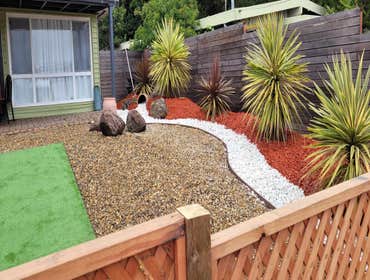 Photos by Landscaping La Economica LLC #1 Installed artificial turf, paver stone walkway, decorative mulch, and a new wooden fence. This project provid