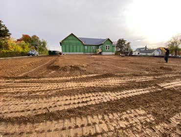 Photos by Madlandscape #3 200 yards of fielder in 200 yards of topsoil, graded out and slopped away from the house this project approximately took thre