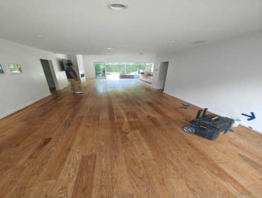 Hardwood flooring refinishing High traffic hardwood flooring with scratches and water damage - our hardworking crew managed to revive that flooring and