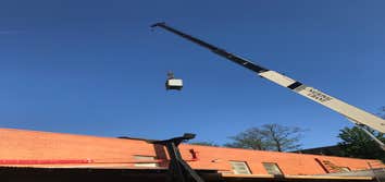 Photos by J and J Electrical Works Inc #1 Installing transformer for roof top unit.