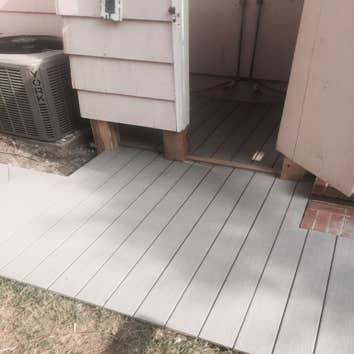 Trex Walkway on Oceanfront Home We built a Trex walkway on the side of a customer's home. Original brick was underneath, and the area would get flooded
