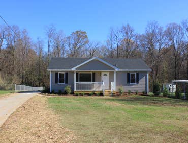 Home Renovation Nearly a 100% home renovation. Added porch, replaced roof, siding, flooring throughout, appliances, every fixture and outlet. New cabin