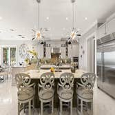 Photos by Russell & Russell Construction LLC #1 New, 3 story 6500 square foot custom home with 6 bedrooms, 7-1/2 bathrooms, Wine room, Den, Library, El