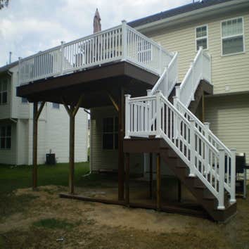 Azek Deck This is a 2nd story deck built with Azek decking and vinyl railing.