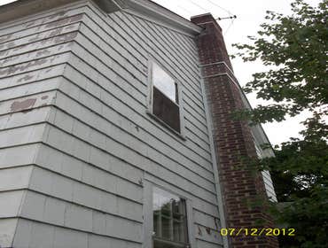 Brilliant Painting, LLC Exterior Project 1 Before and after photos of a full house that has been power washed, scraped, hand sanded, primed, and painte