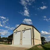 30X36 Metal Garage with Stone Veneer Wainscot