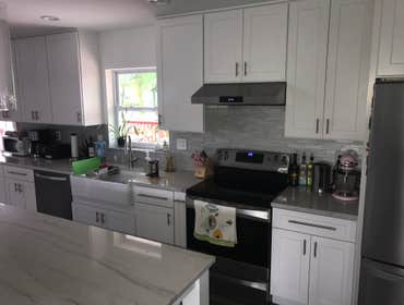 Photos by Dorin Building LLC #1 Full remodel: new kitchen, new bathrooms, new windows, new exterior door, new ceramic floors.