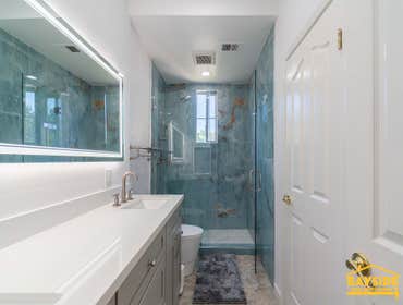 Photos by Bayside Home Improvement Inc #7 Two new bathroom remodels. One guest bathroom covered from tub shower combo to a walk in shower and New maste