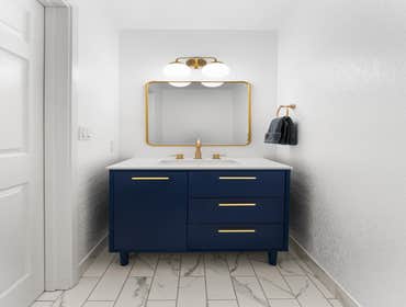 Tracy | Powder Room For this powder room remodel, we focused on bringing a clean, sophisticated feel to a compact space. We installed sleek porcelain f