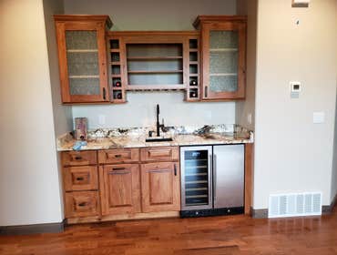 Photos by North Country Construction Inc #1 We built this gorgeous 5,000 SF house for a client in the powderhorn. It has a attached 3 car garage on a n