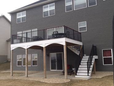Photos by Custom Home Specialties Inc #2 Timber Tech maintenance free decks with powder coated railings.