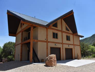 Hanna Cabin Accessory cabin constructed adjacent to the client's existing cabin in rural Utah on a property directly fronting the Duchesne River. The 