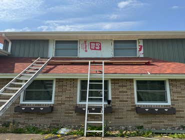 Photos by Excelsior Home Improvement #2 Remove/re-install siding, insulate around existing windows and aluminum clad window trim