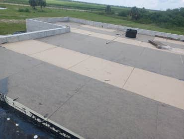 Photos by Yavel Construction & Roofing #3 New flat deck roof with insulation