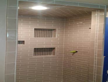 Master shower Master shower tiled with 3"x 6" subway tile. 2 shampoo niches and 1 soap niche tiled with glass mosaic
