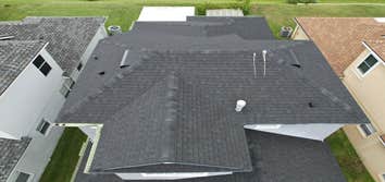 Photos by WOODSTONE ROOFING