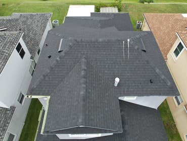 Photos by WOODSTONE ROOFING