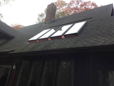 East Patchogue Job Replaced 4 - Homemade Type Skylights and Replaced with a 4 - Supreme -Gang Type Mulled 29 x 69 Fixed Pitched Roof Skylights