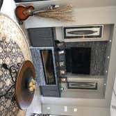Motorcoach Country Club - Outdoor living This casita/outdoor living area has a lot of special features one of which is a custom guitar pool!
