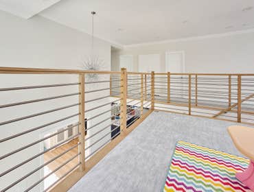 Photos by San Clemente Woodworking #1 Stainless Steel horizontal rods with our custom shadow posts. Clean lines and modern design.