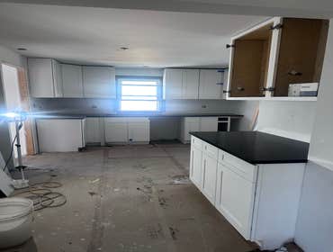 Gut Rehab SFH South Holland Gut rehab, with MEP, bathroom reconfiguration, basement structural wall rebuild, waterproofing, and exterior improvements.
