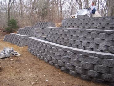 Lewis Landscaping Inc Project Residential & commercial lawn maintenance. landscaping, rock, stone, wall, patio, & walkway construction.
