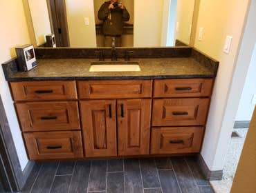 Photos by North Country Construction Inc #1 We built this gorgeous 5,000 SF house for a client in the powderhorn. It has a attached 3 car garage on a n