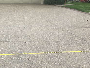 exposed aggregate Driveway Photo by Potoroka Concrete Macomb MI