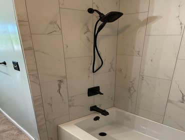 Photos by Small Valley Contracting #1 Removed pre-existing tub and tile on walls. We installed new tub, tile, tub fixtures.