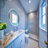 Two bathroom remodel This album showcases two stunning bathroom remodels in an Oakland home, each blending luxury with thoughtful design. One features 