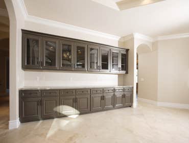 Custom Cabintry Storage space is a necessity in a home. We installed custom cabinetry to make better use of an open space in this home.