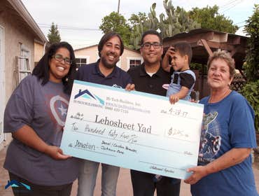 Charity Check-Hernandez Family