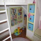 Convert attic space to child's playroom We reconstructed the framing in this attic space and created a wonderful space for a young child to play.
