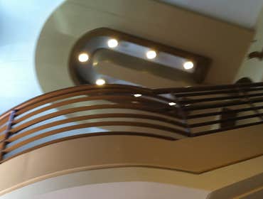 Photos from Ellis & Sons Painting Repainting the university of Utah Alfred Emery building walls six colors with handrails and had it done within a mont