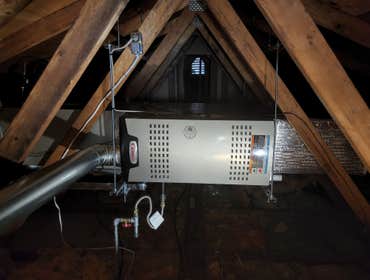 Photos by Castle Heating & Air #1 Furnace replacement with relocation, and A/C add on.