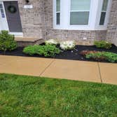 Photos by Blue Stone Landscaping LLC #6 Trimmed bushes, added mulch and 10 low voltage lights installation.