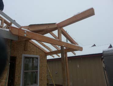 Photo(s) from Goodman Construction Front entry way glu lam beam handcrafted