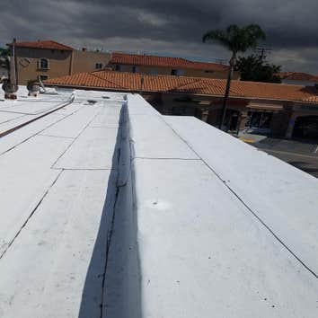 Photos by Abrego's Roofing #1 Installed new engery cap torch down