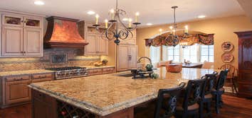 Wooded Stunner A contemporary take of a Tudor style home designed by Kil Architecture Planning; custom built by Martin Bros. Contracting, Inc; interior