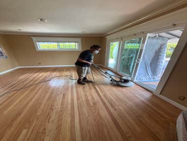 Photos by Floormasters & Design #1 Hardwood floor sanding and refinishing with some repairs.