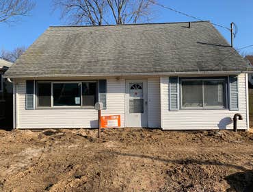 Photos by Wild Atlantic Home Design #1 Before , during and after photos of this 2nd floor addition with full new exterior completed for this build zoom