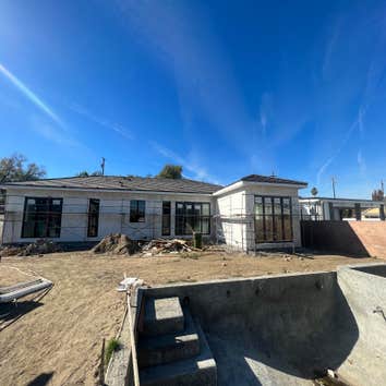 Photos by Precise Building & Restoration Inc #1 This is a New Construction with 14ft High ceilings all across the home, this home was designed & crafte