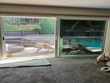 Photos by Low Price Window Tint #1 Window Film installation for solar protection and privacy in a Livermore CA home.